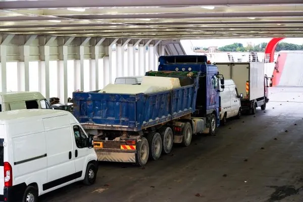 trucks minibuses located inside ferryboat greece